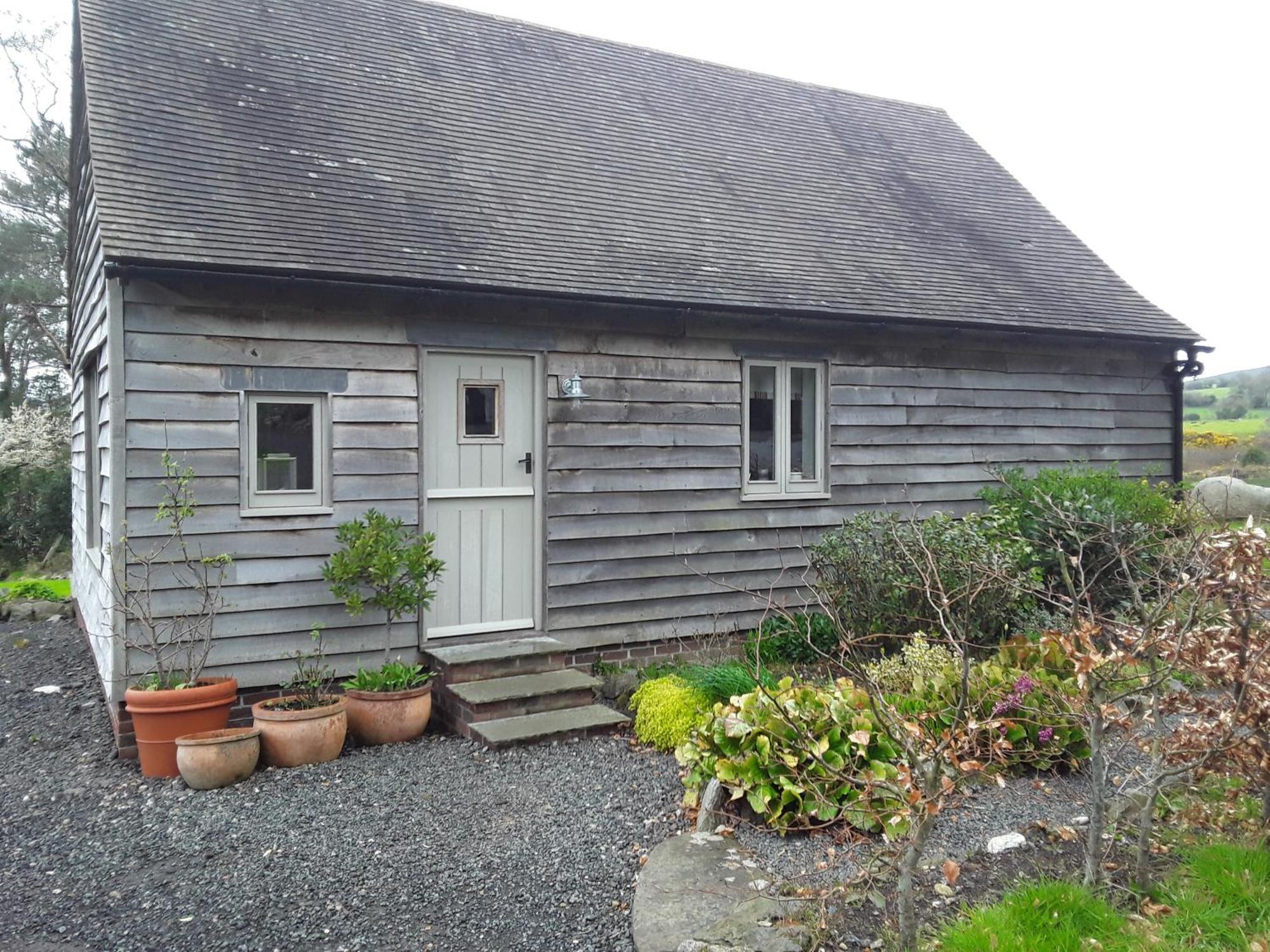 Villa The Old Cowshed Roundwood Esterno foto